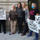 Rolande Baker, Nikki Enfield, and Emily Paterson protested inside the Supreme Court on Nov. 2. They were arrested and jailed for 30 hours in what Baker, who’s been jailed for civil disobedience on numerous occasions, called “the most inhumane place I’ve ever been.”